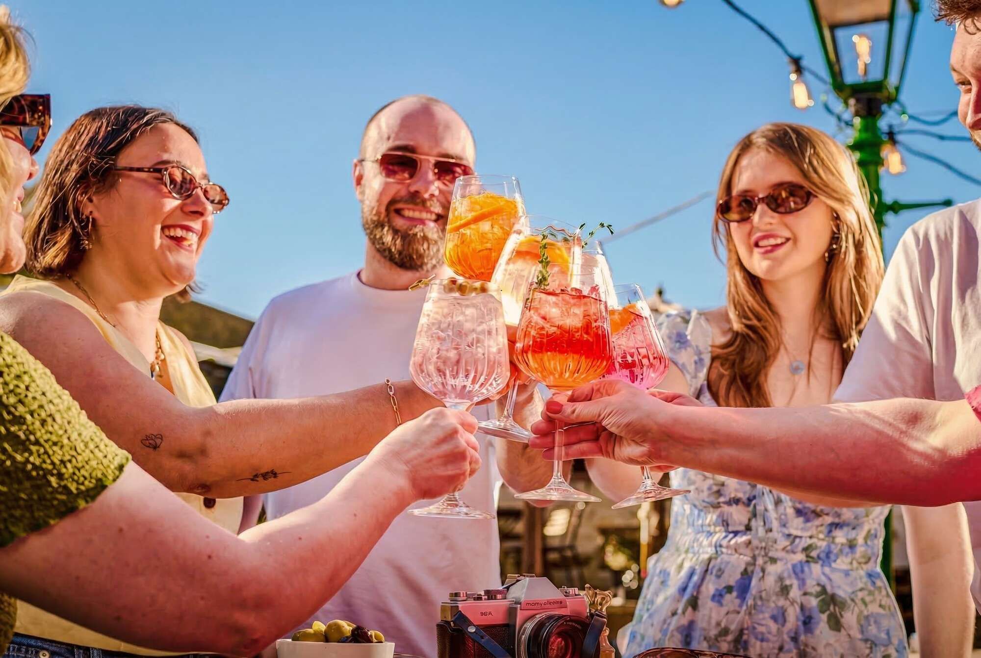 People enjoying spritz in the garden