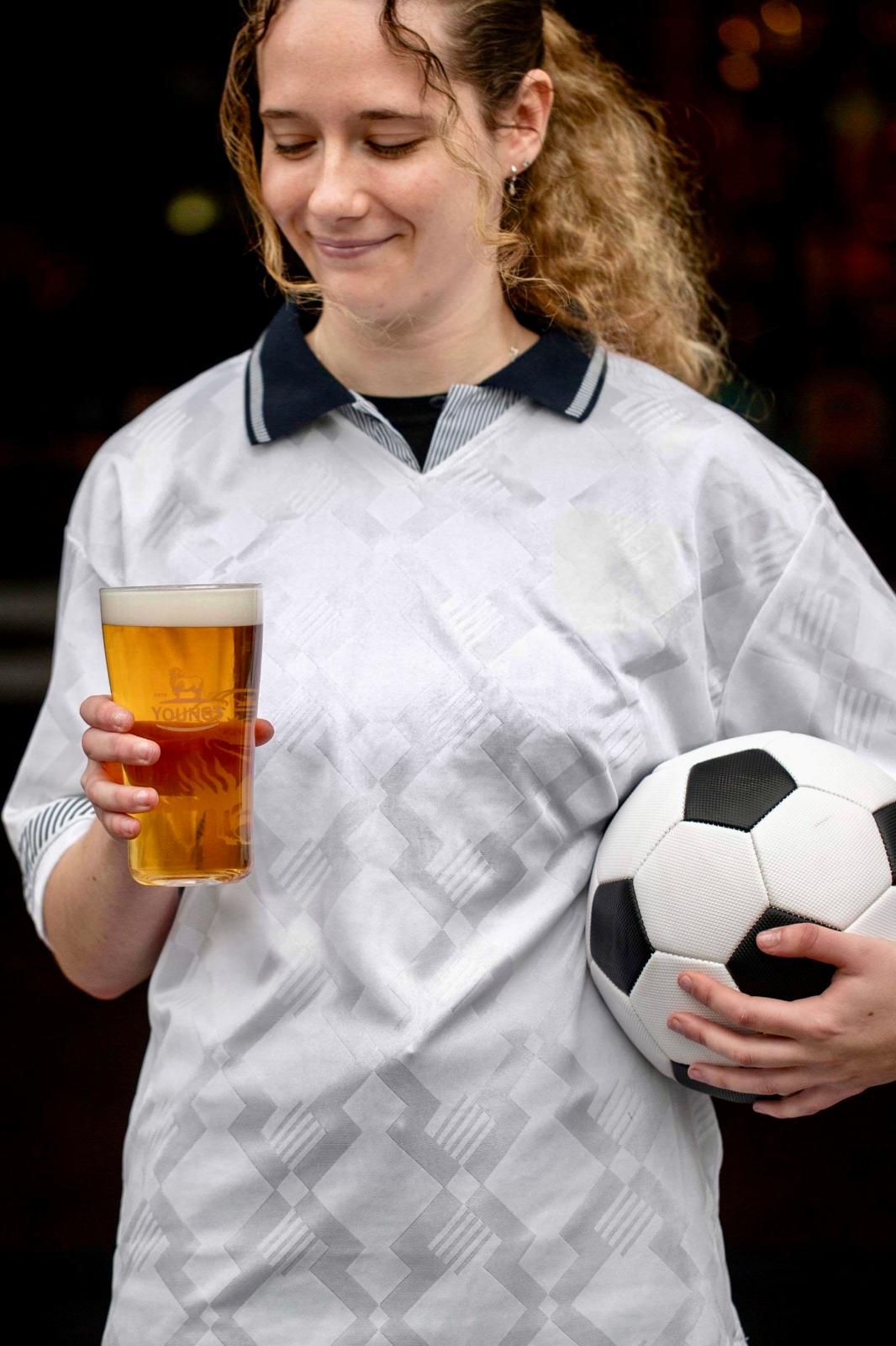 World Cup FIFA FOOTBALL HOLDING A PINT